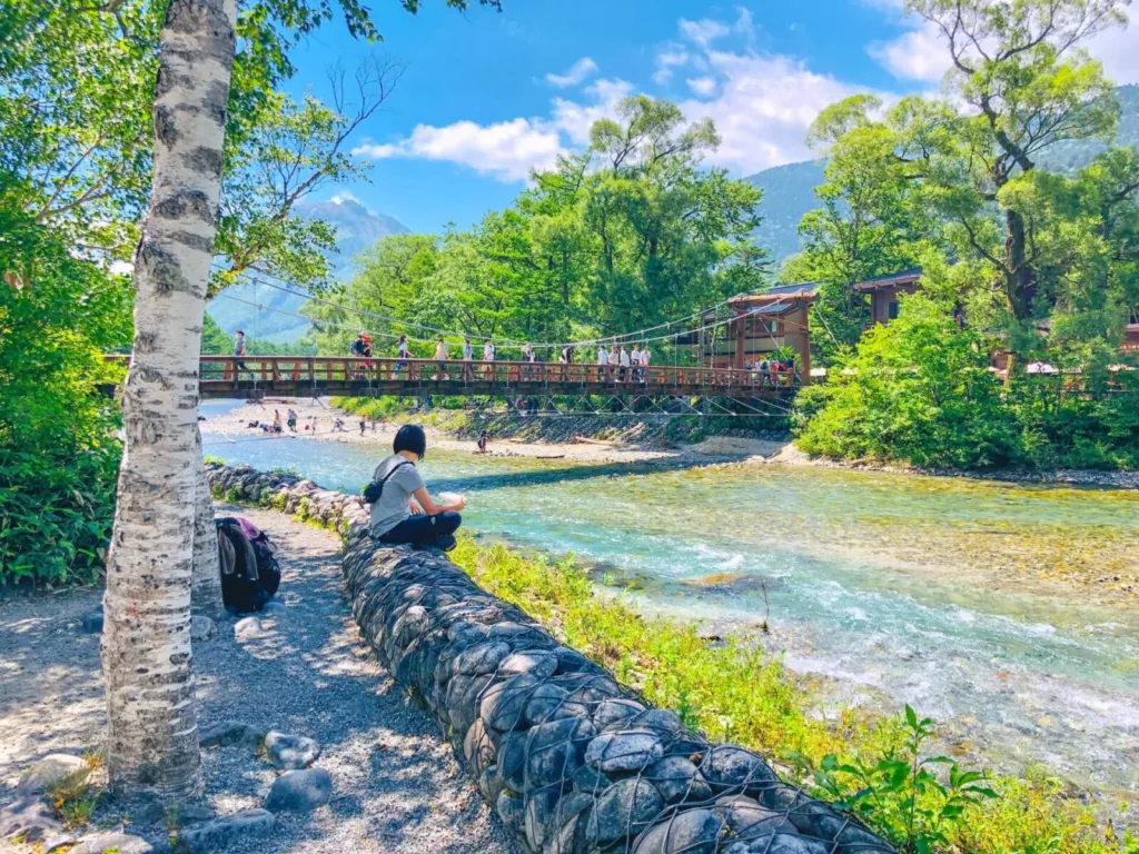 The Kappa Bridge and Asuza River on a beautiful day in Kamikochi, Japan