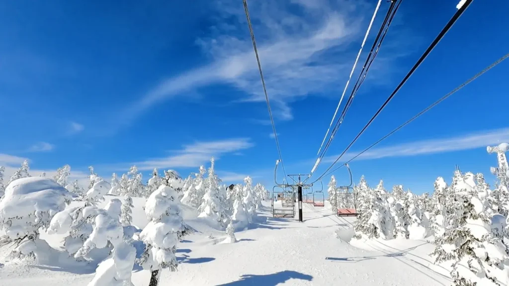 The frosted over scenery of the landscape on a ski run in Shiga Kogen, Japan.
