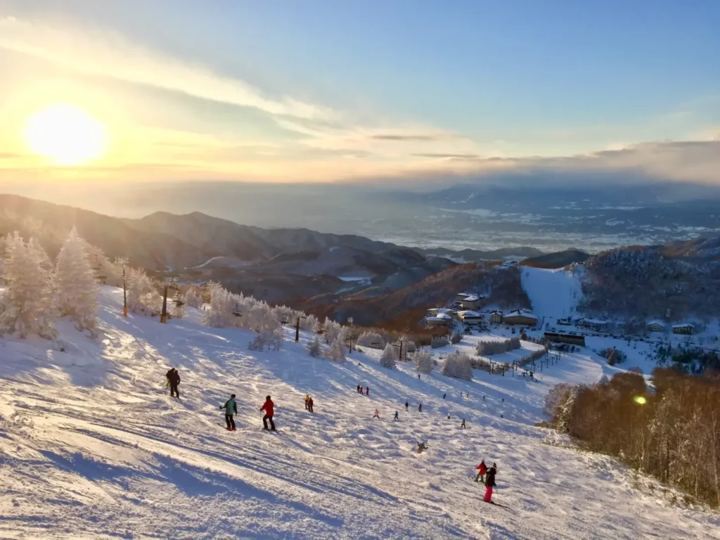 The sun sets on a slope in Shiga Kogen Ski Resorts.