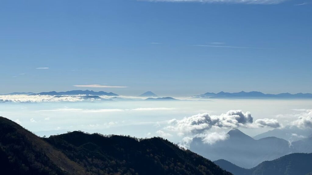 Mt. Fuji in the distance from the summit of Kirigamine in Nagano Prefecture.